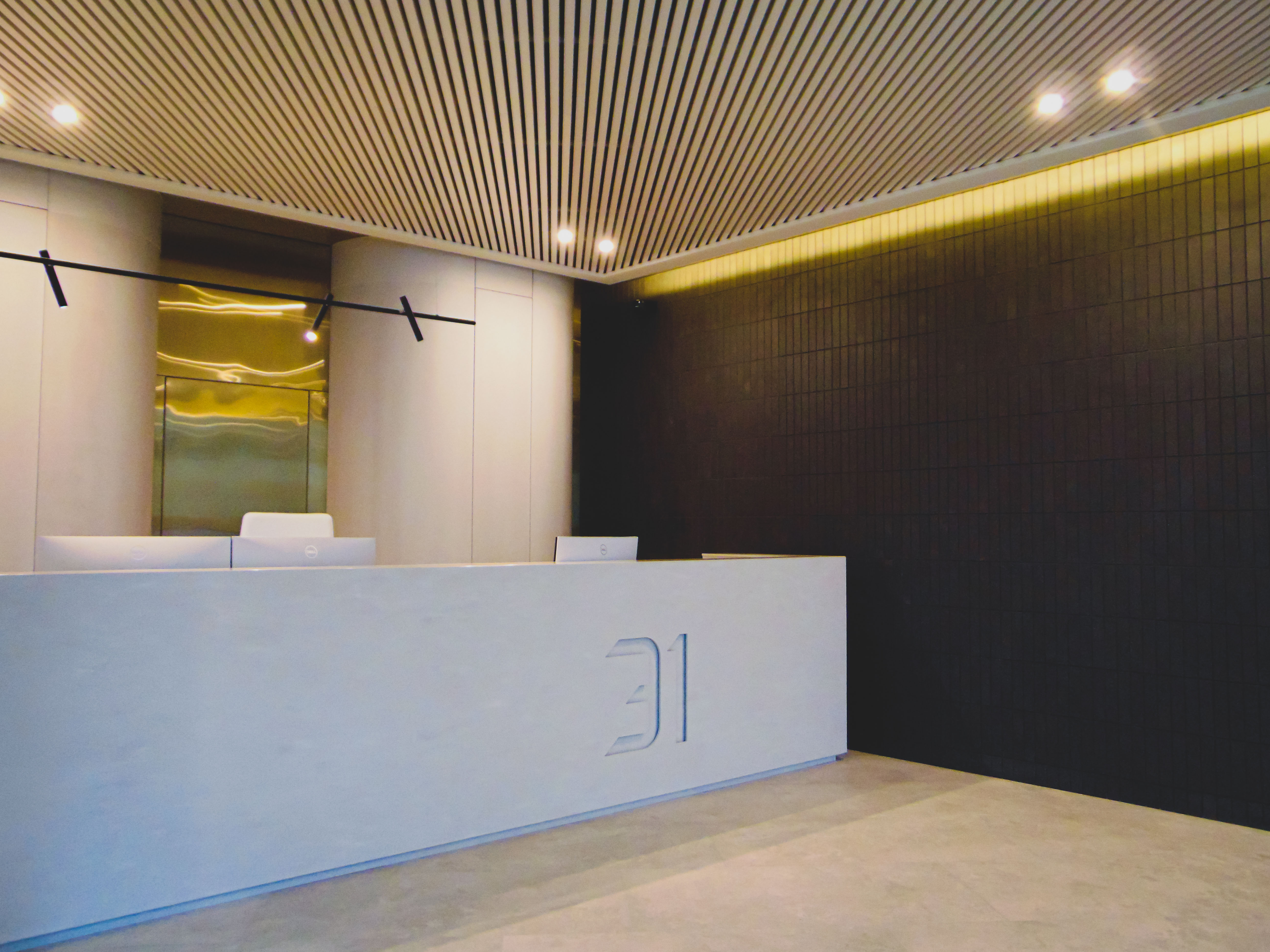 The cube-shaped KRAFT rail in common areas of a new residential building.