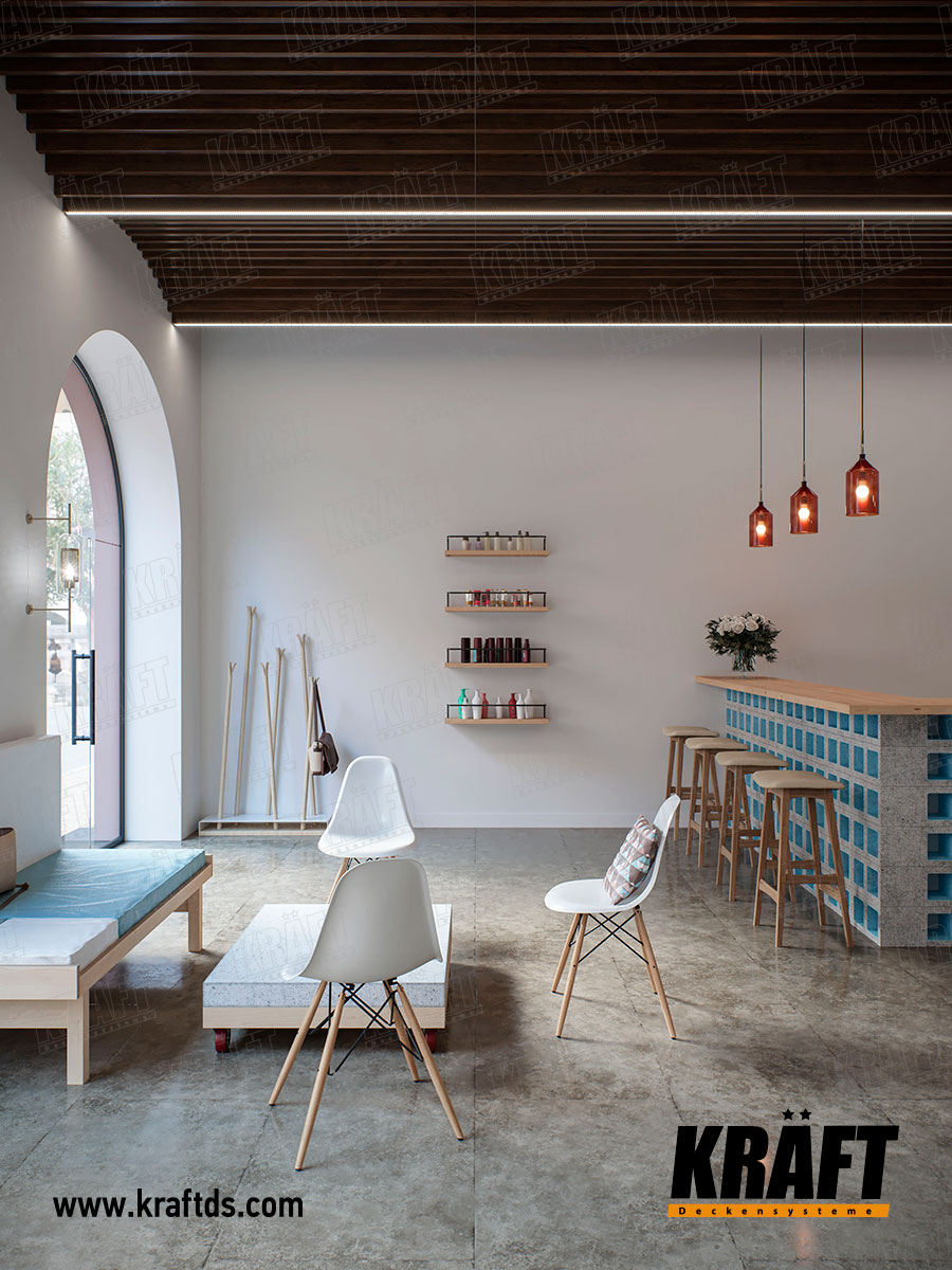 Sufit podwieszany z listwy KRAFT w kształcie kubu we wnętrzu zakładu fryzjerskiego