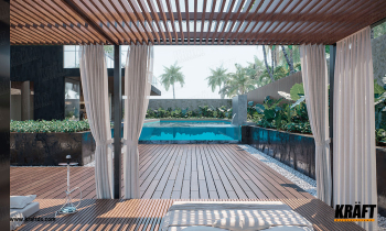 Sufit podwieszany z metalowej listwy kubicznej produkcji KRAFT we wnętrzu strefy rekreacyjnej z basenem